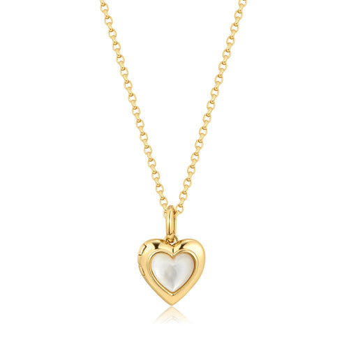 Gold heart-shaped pendant necklace on a white background