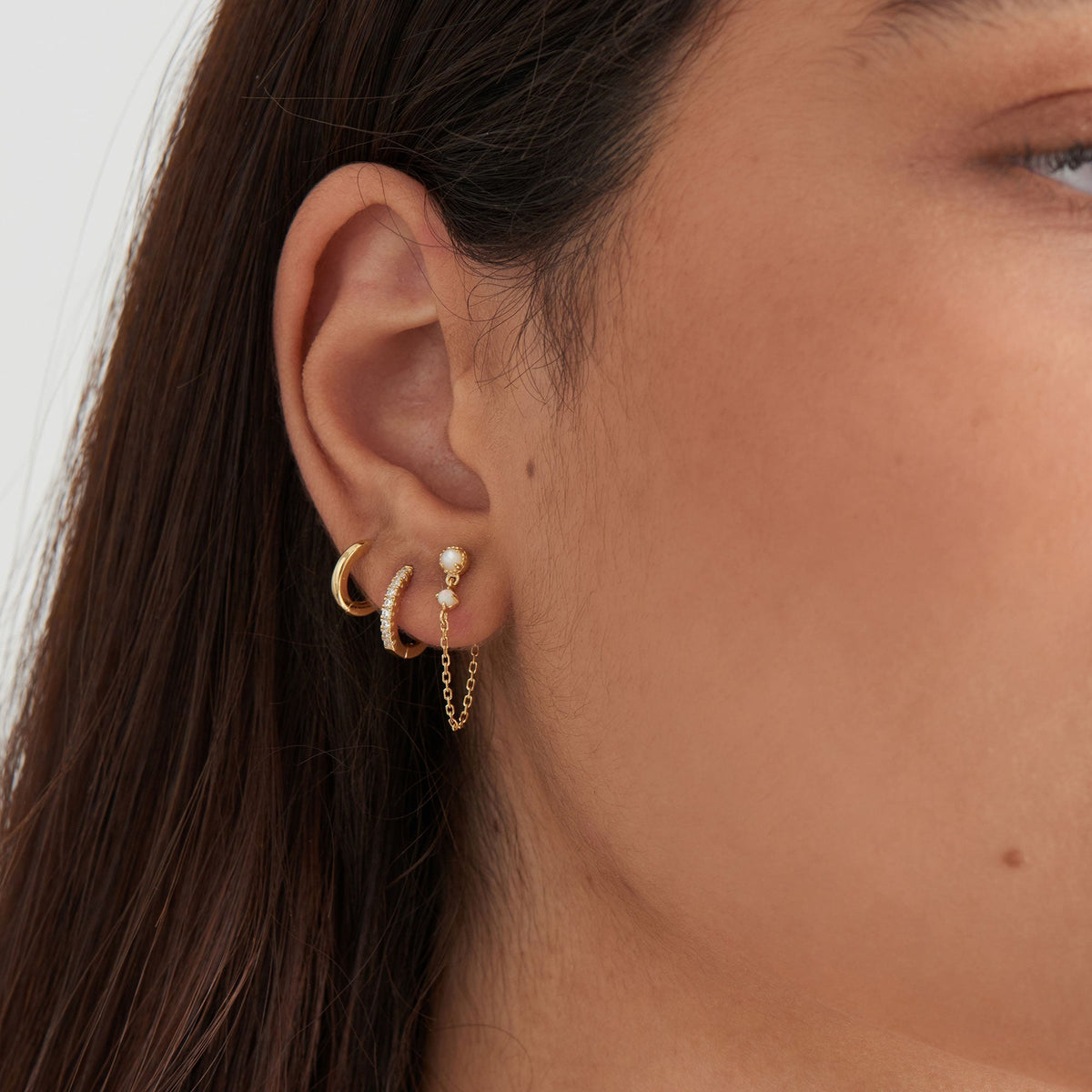 Mini huggie hoop earrings deals